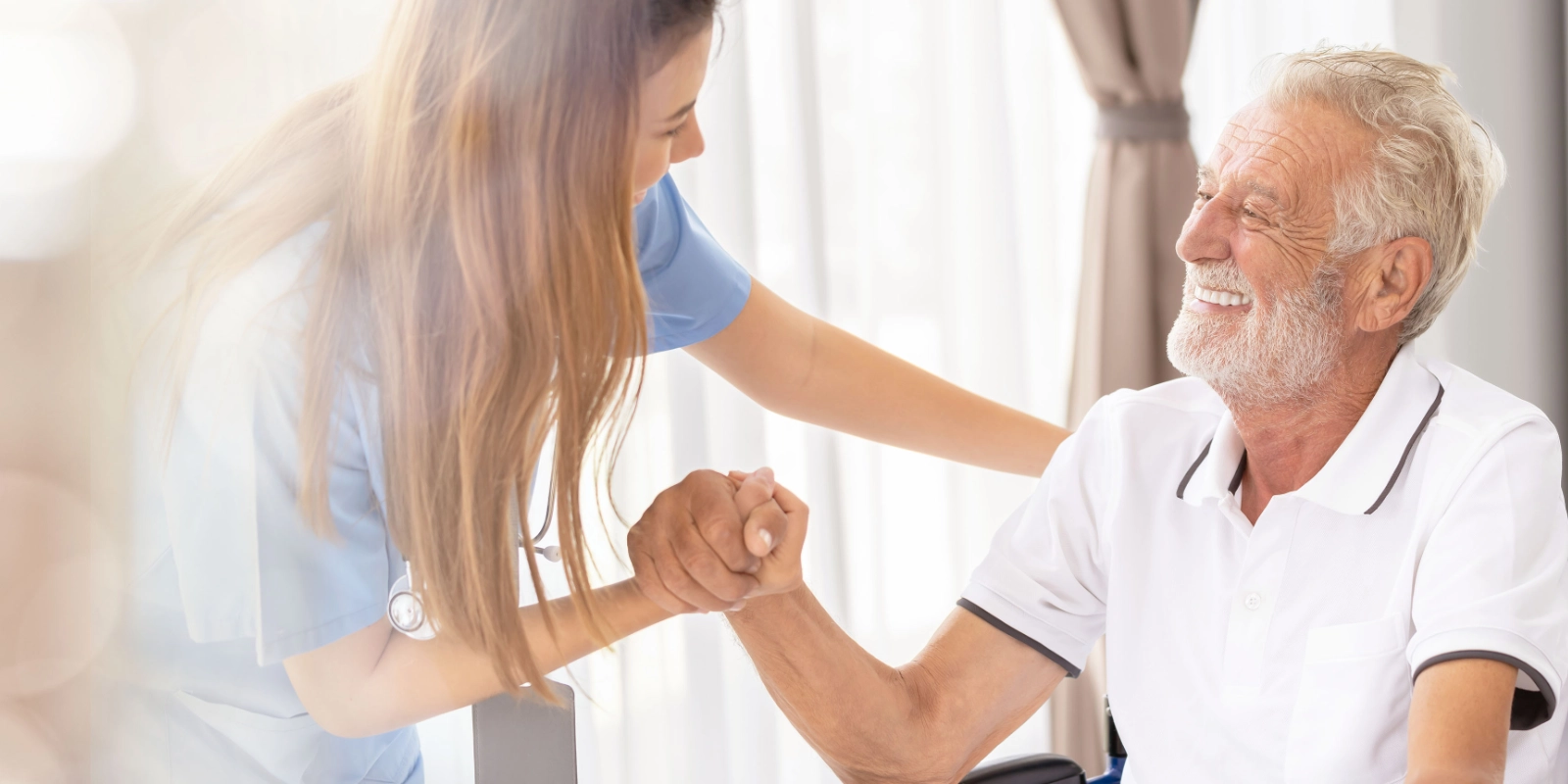 A nurse supporting a patient during a visit
